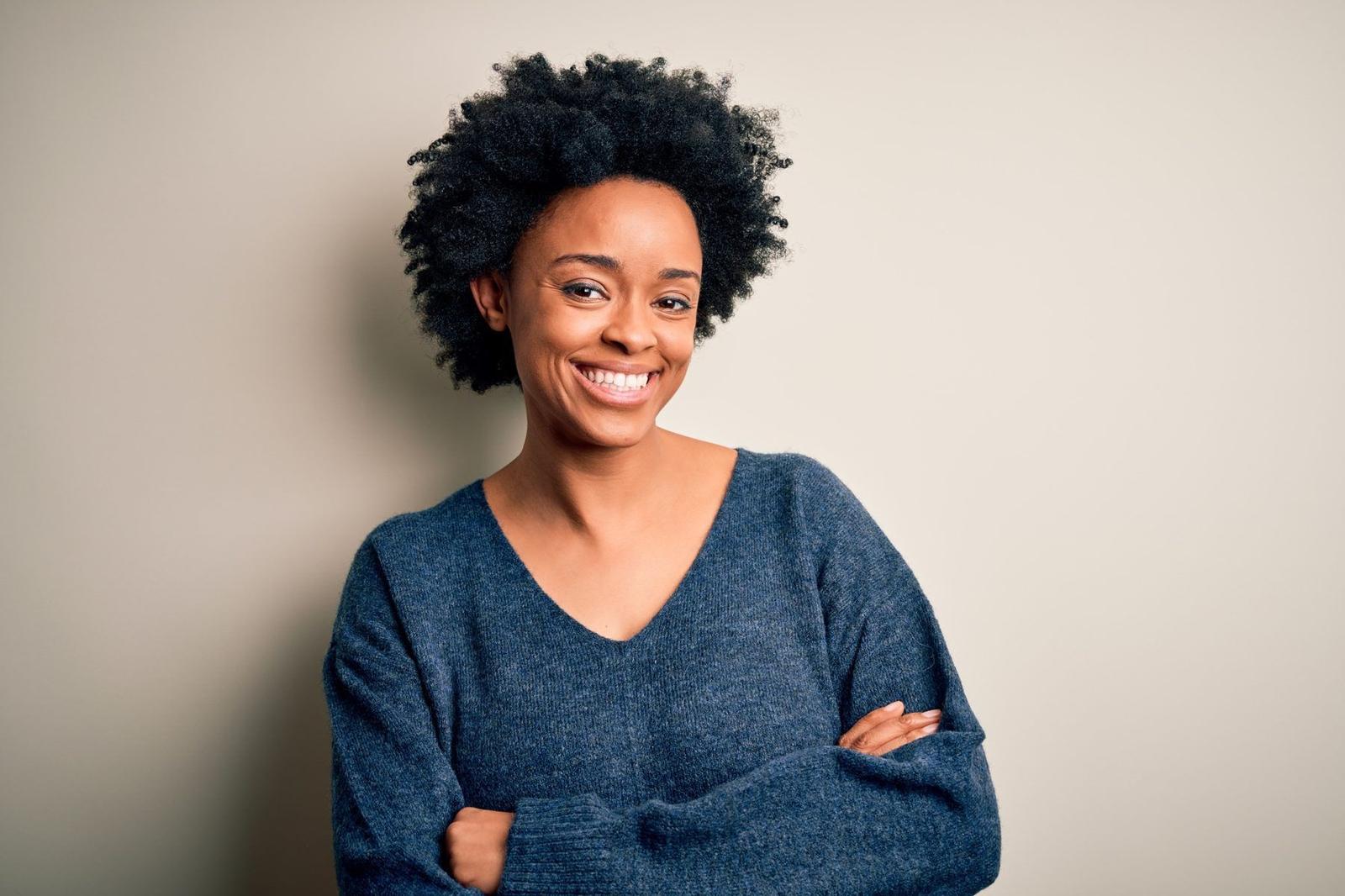 A confident, smiling young woman
