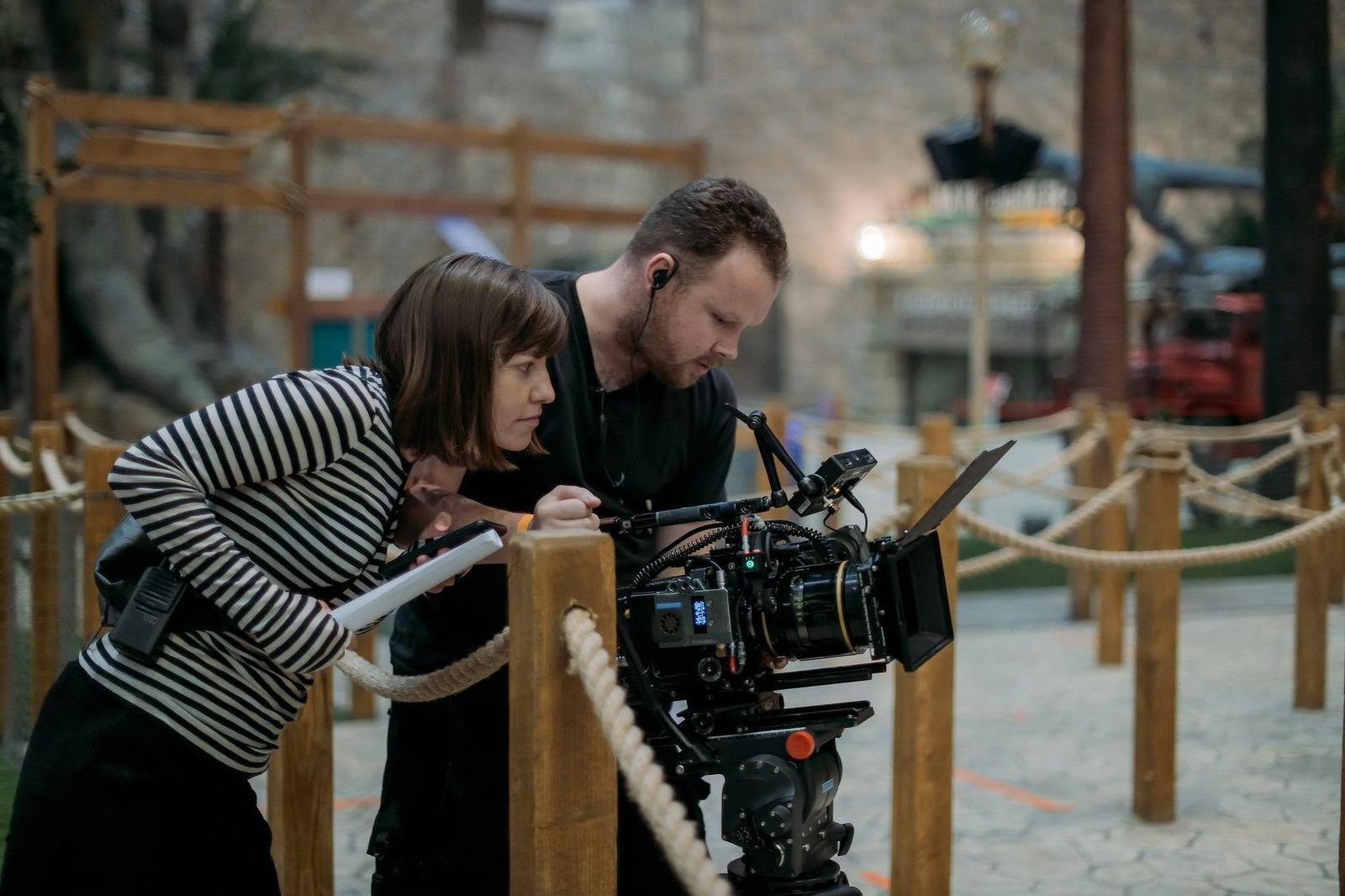 A creative director reviewing footage on a monitor