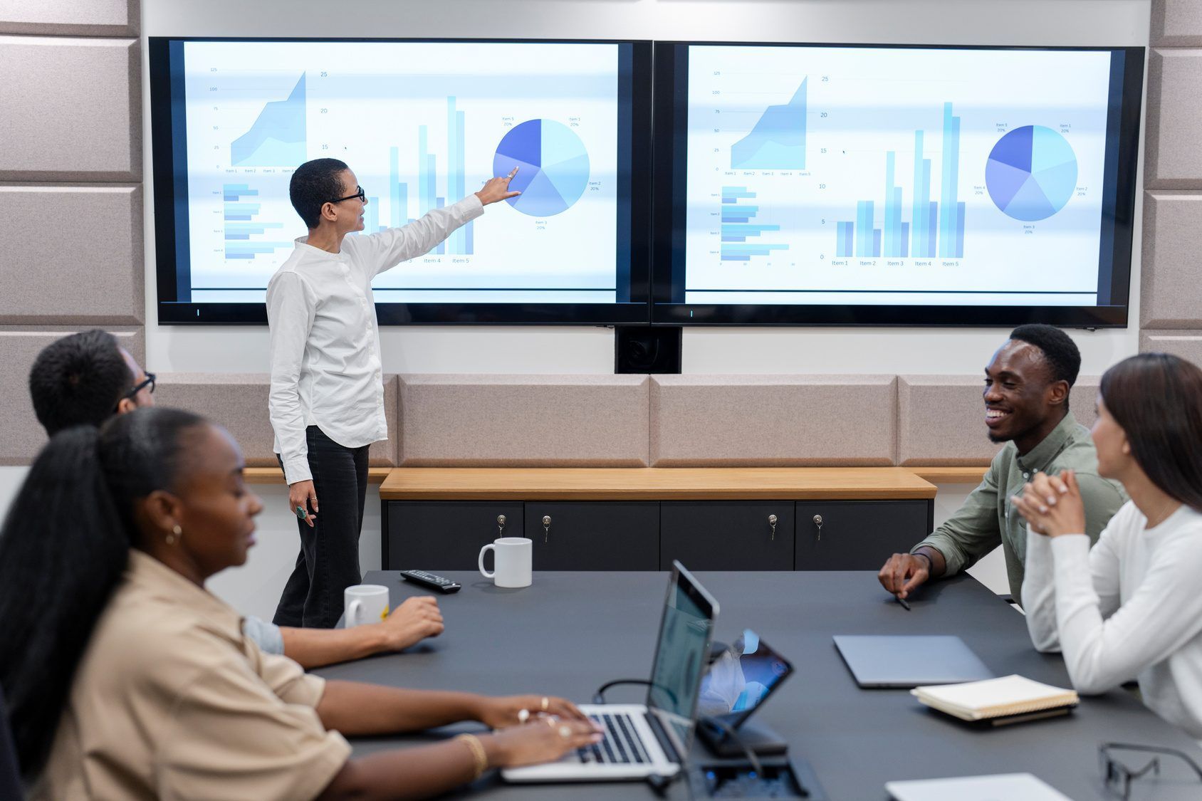 Senior leaders in a boardroom briefing