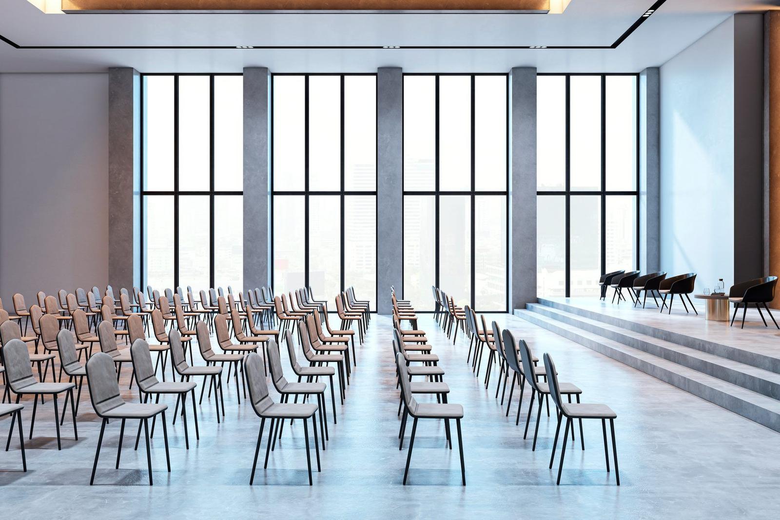 A business meeting around a table in a bright conference room