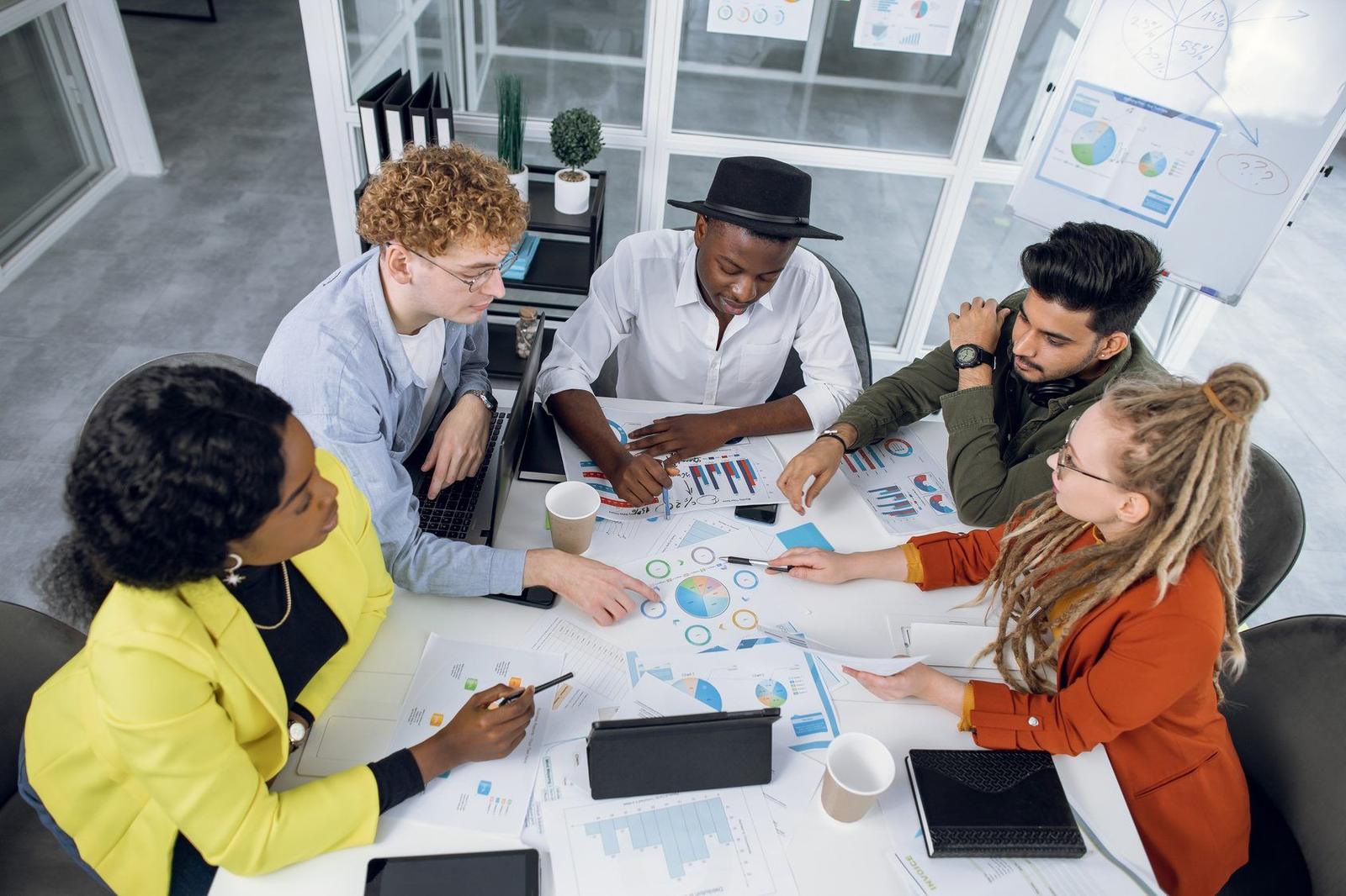 A creative team working together around a table