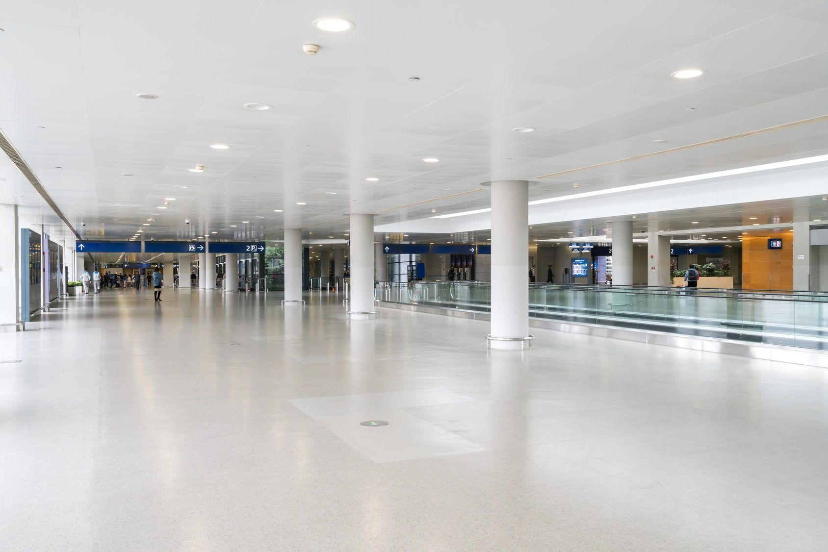 A business traveller with luggage arriving at an airport
