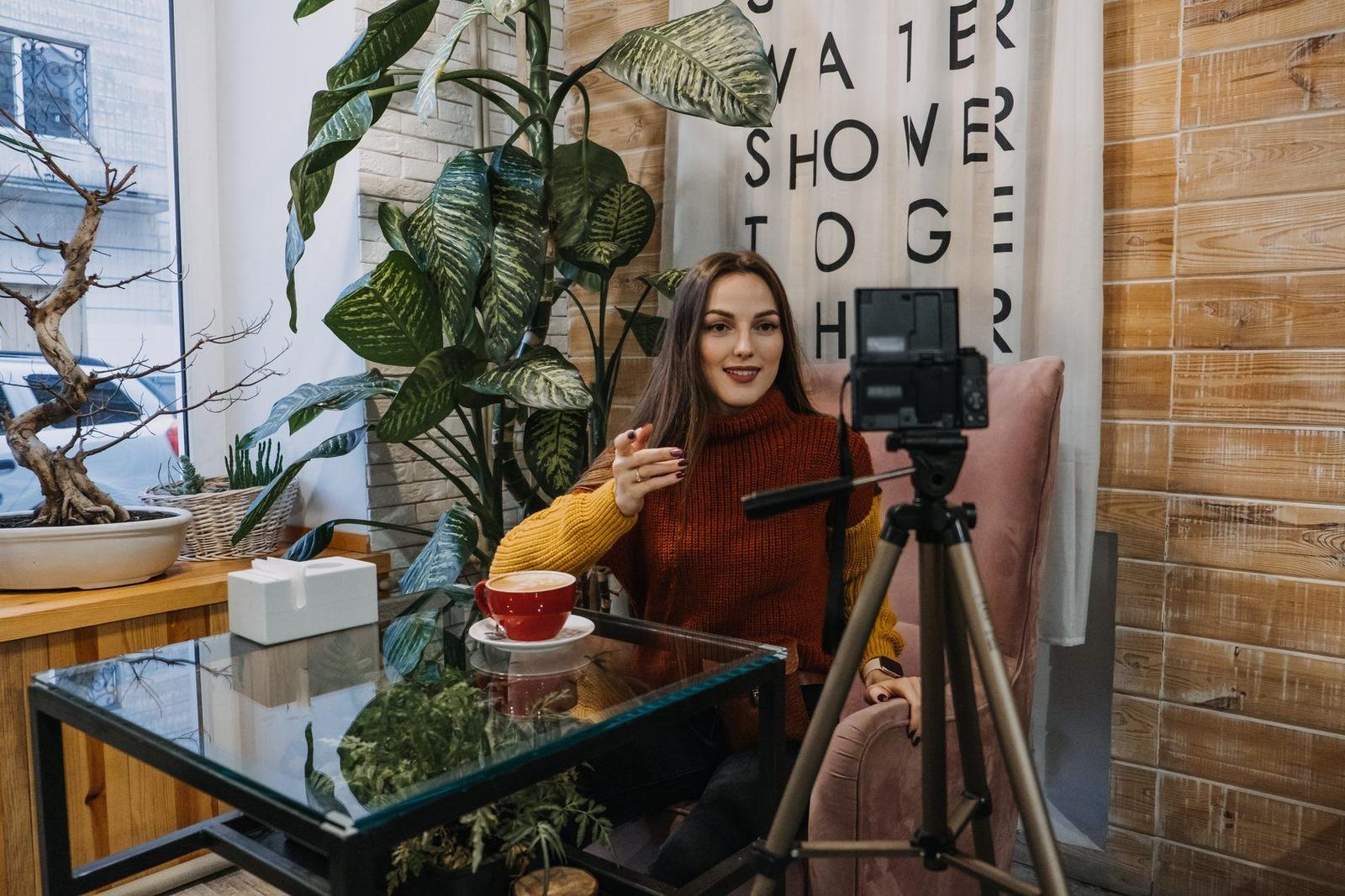 A creator photographing a flat lay for a social post