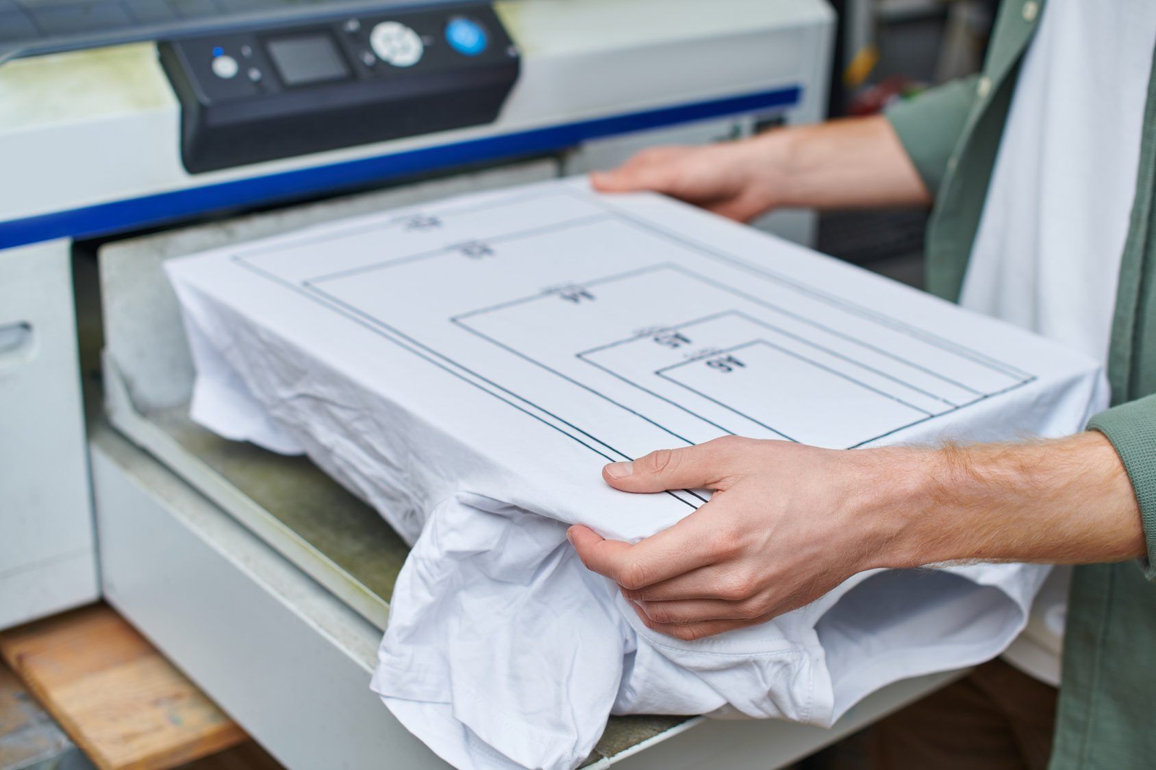 Printed posters and brochures on a studio table