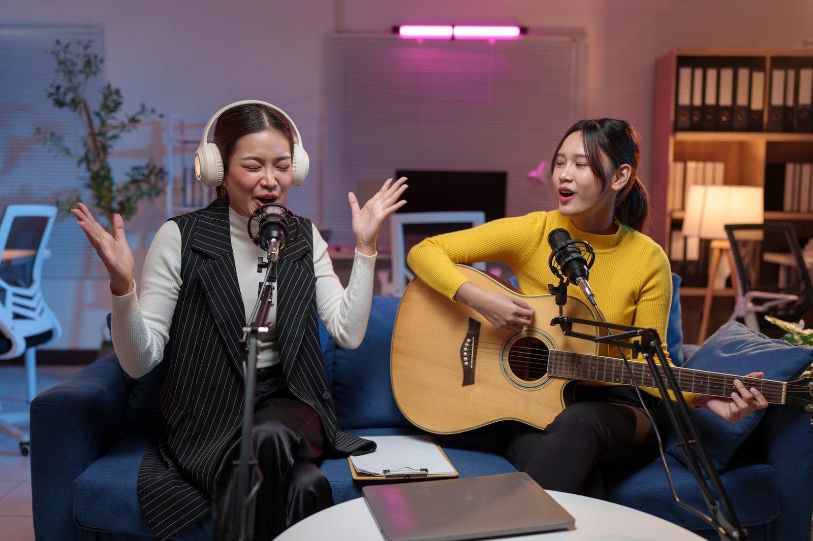 Two people recording a podcast conversation