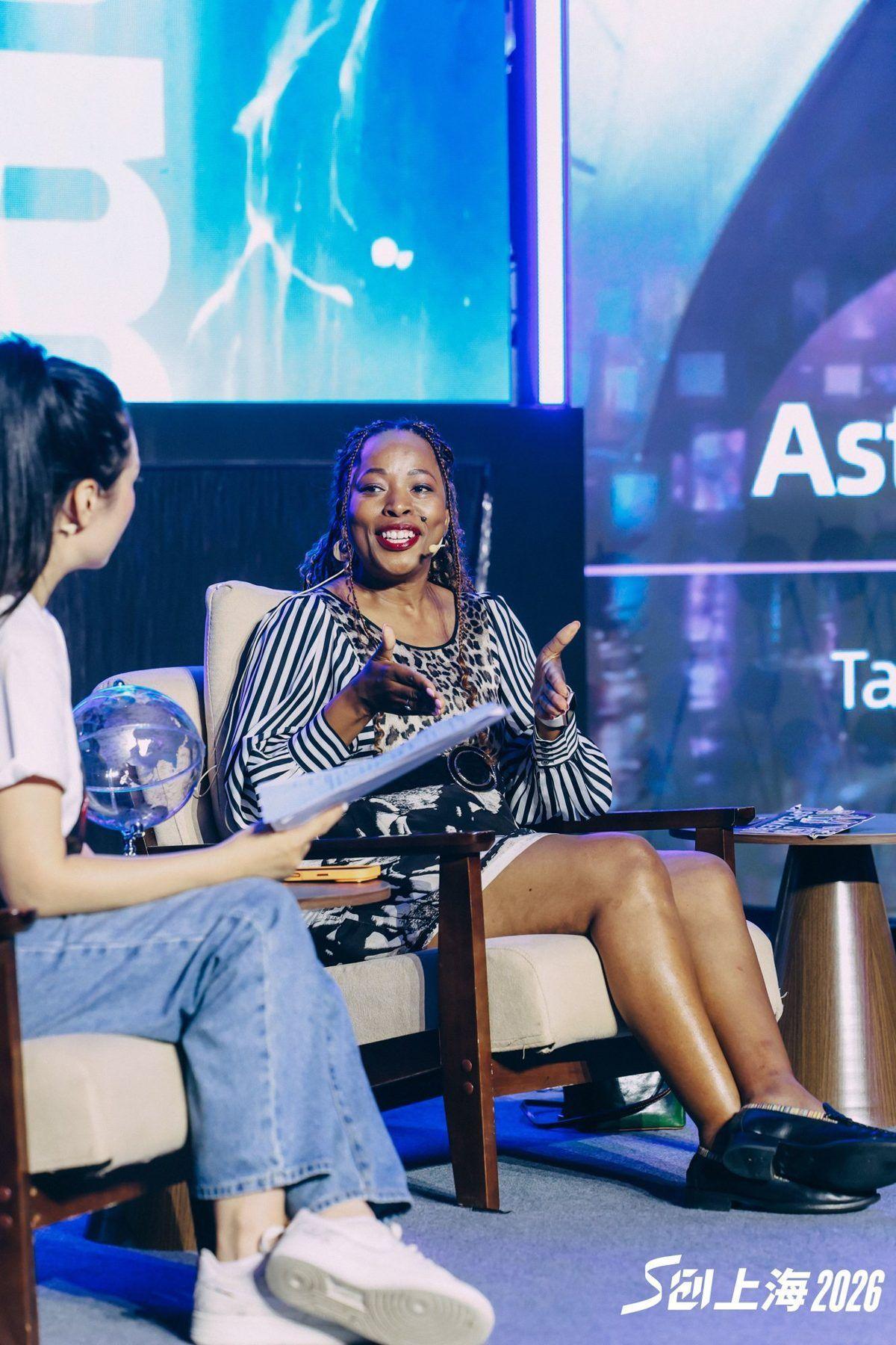 Mpume Zwane speaking on stage at S-Tron China 2026